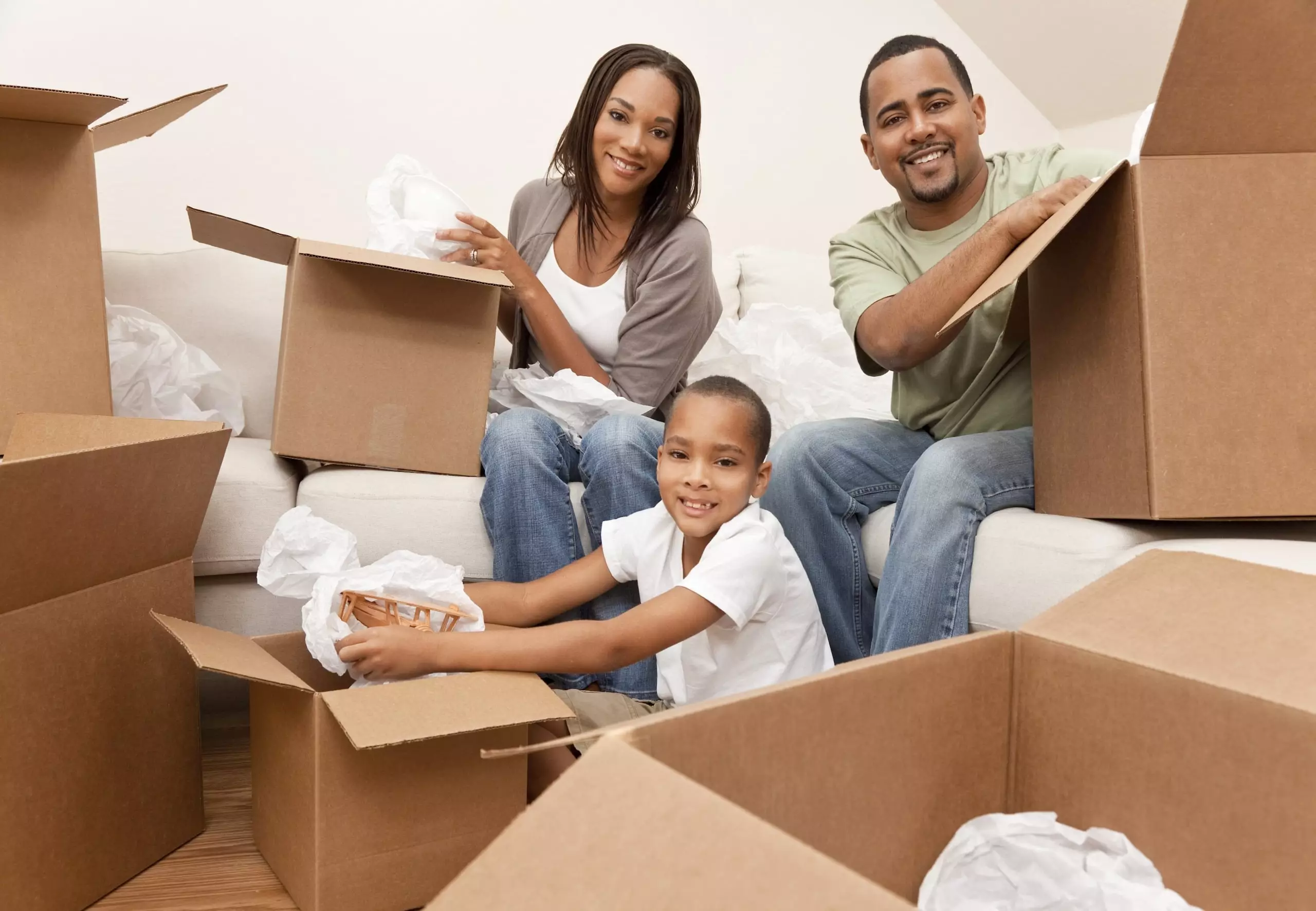 Family with moving boxes